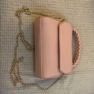 Elegant Pink Handbag with Gold Chain